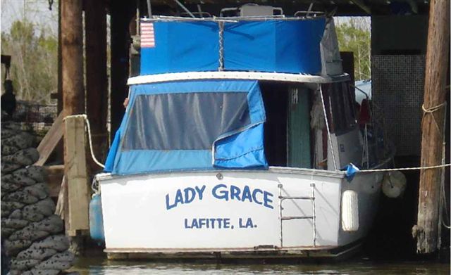 Boat Transom - Boat Graphics - New Orleans - Nola - Sign Removal - Plastic Letters - Raised Letters - Chrome Letters 